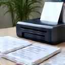 Printer at a pristine desk for a consulting firm