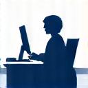 Small business owner working in a home office with an Epson WorkForce printer